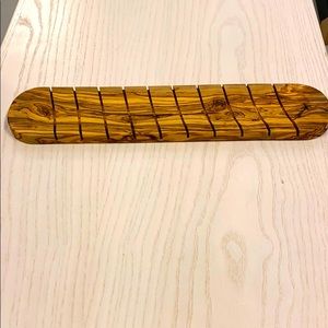 Olive wood slotted bread board